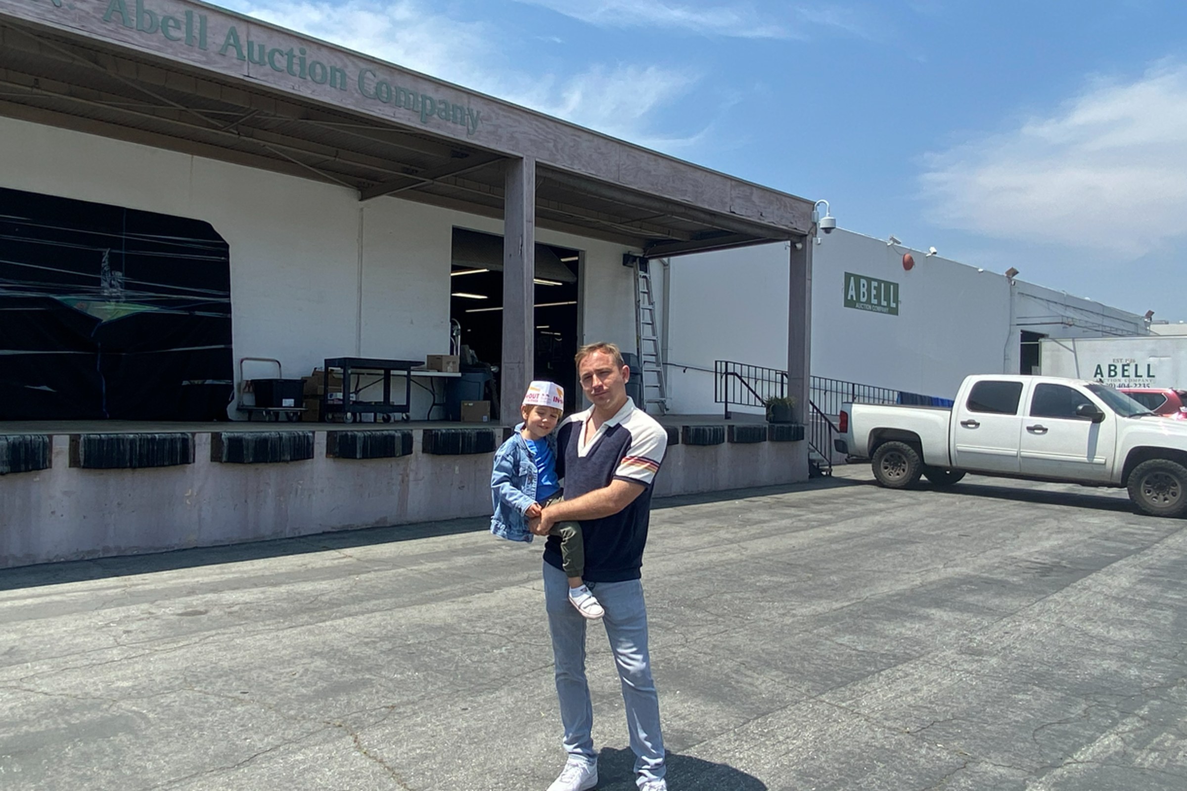 Outside the Abell Auction Company building in Commerce