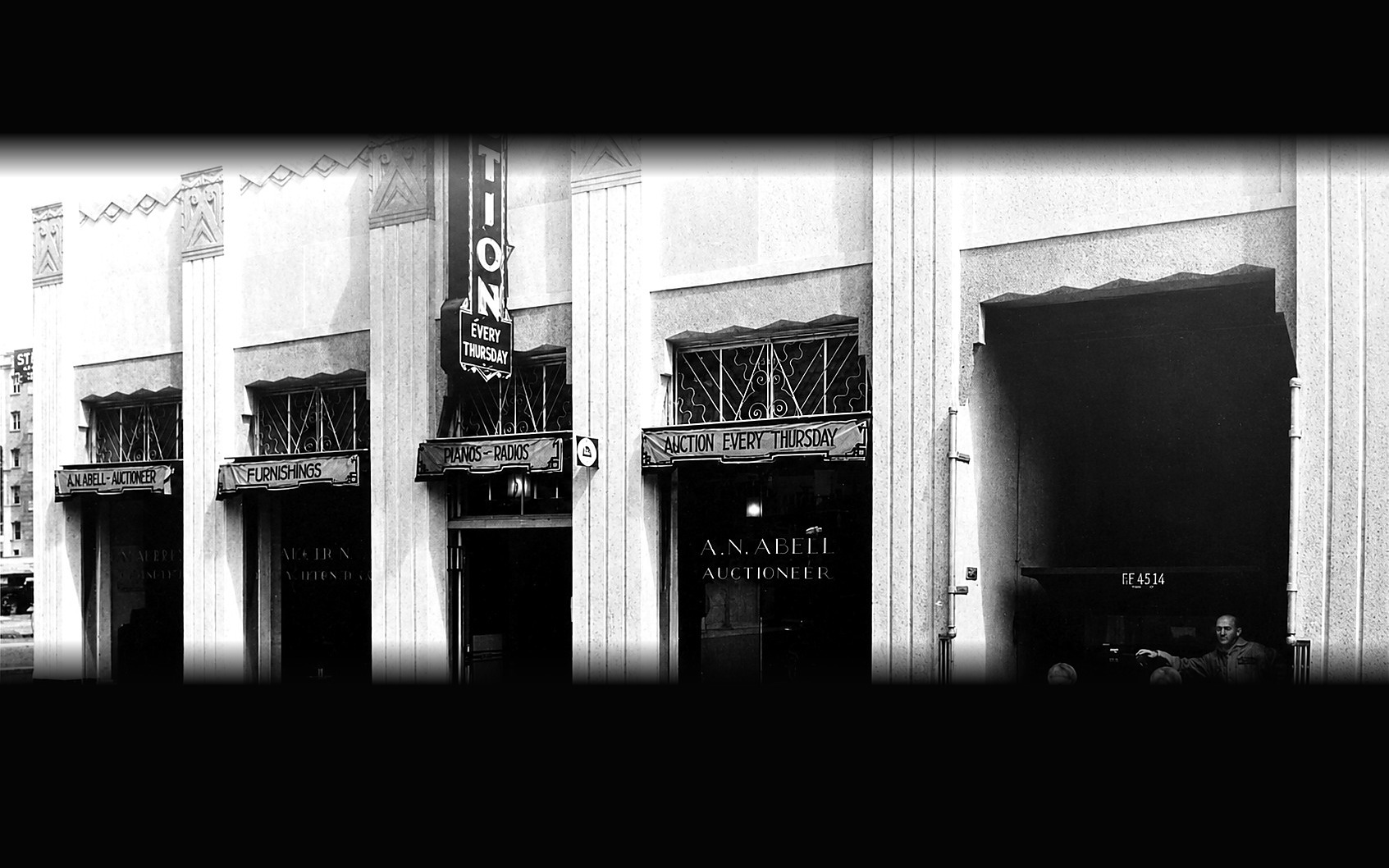 The A. N. Abell Auction Company storefront in Los Angeles, the window lettered A. N. Abell, Auctioneer beneath a vertical AUCTION sign