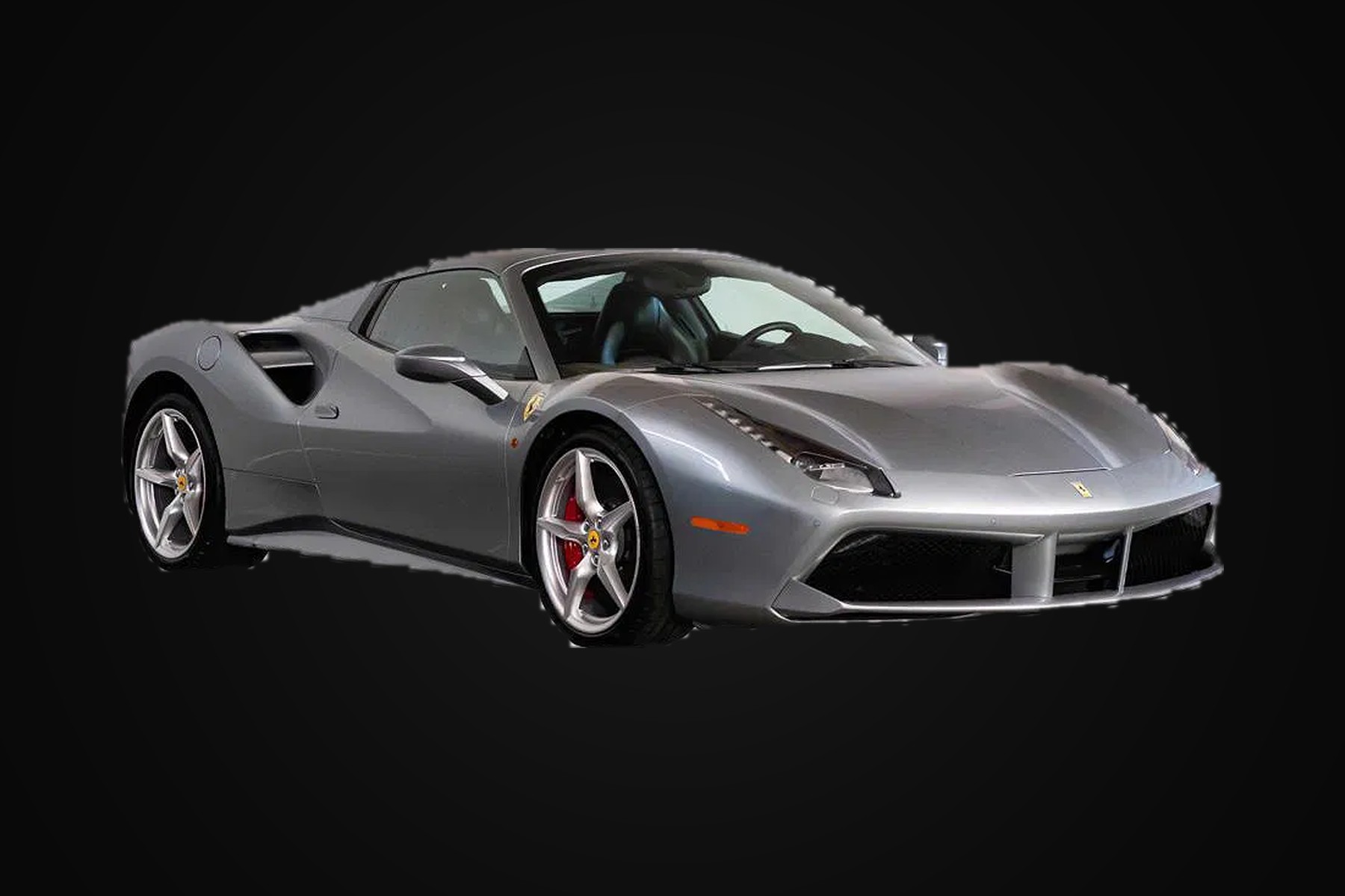 A silver Ferrari 488 Spider