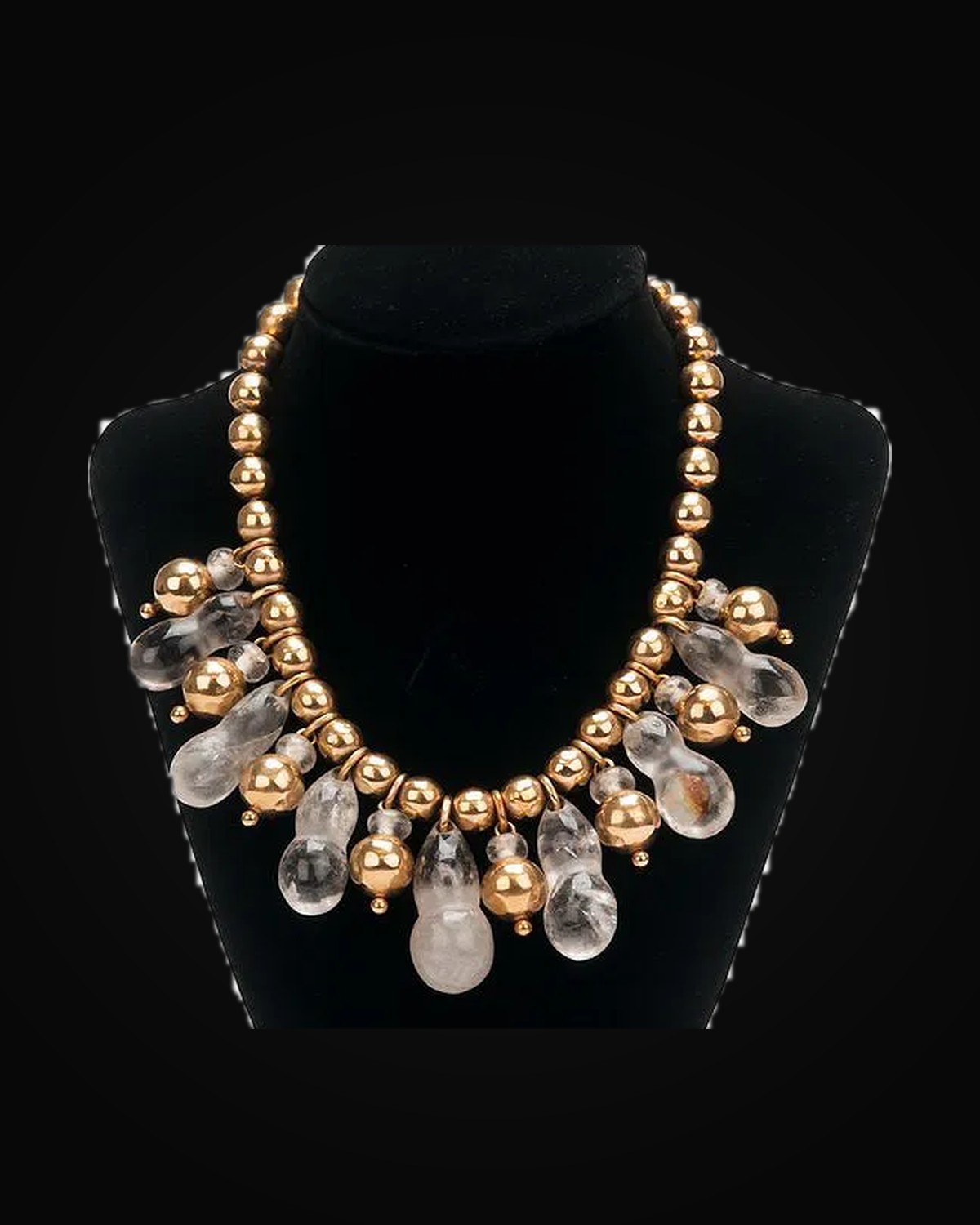 A William Spratling necklace of gold spheres hung with rock crystal drops