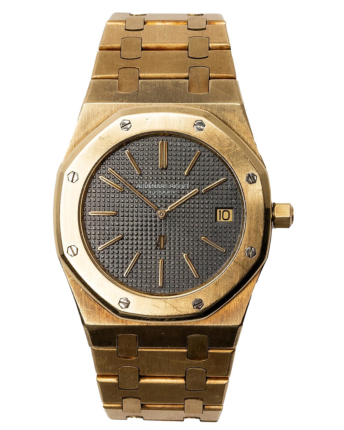 A gold Audemars Piguet Royal Oak wristwatch with a grey tapisserie dial