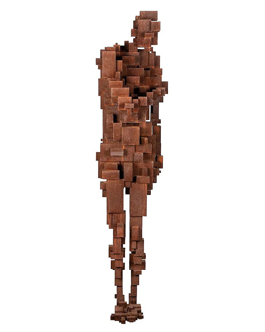 A standing human figure built from stacked rusted iron blocks