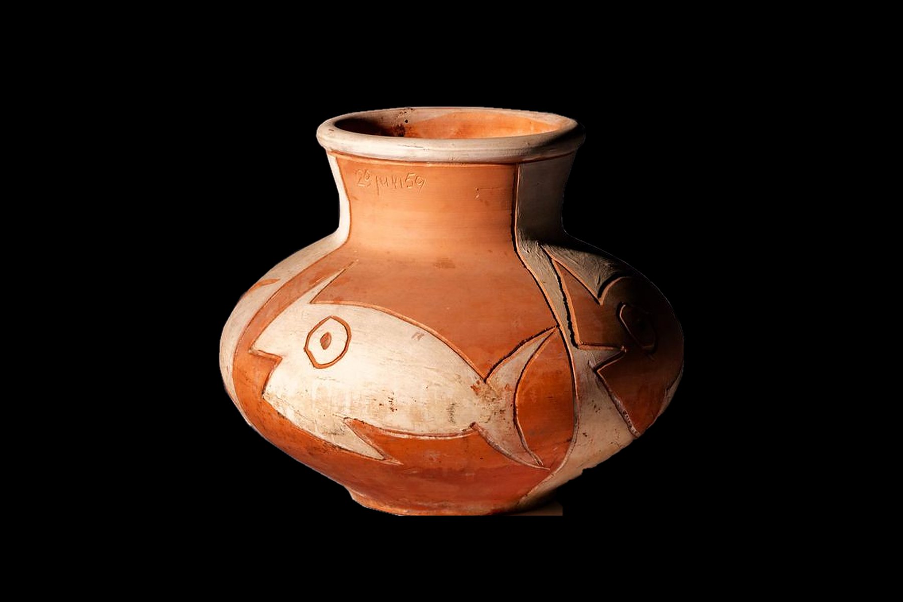 A terracotta vase incised with a large white fish, dated on the neck, on black