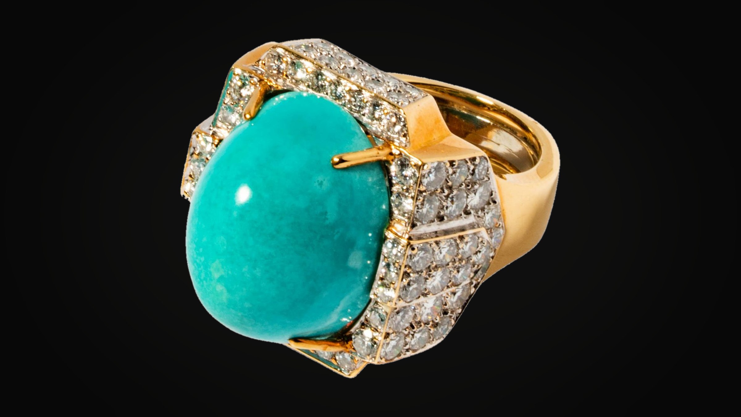 David Webb — an eighteen karat yellow gold, platinum, diamond and turquoise ring, on black