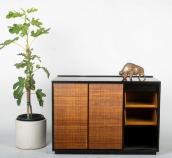 A Dunbar rattan-front side cabinet from the Cullen estate will be sold on September 27th at Abell Auction Co. in Los Angeles.