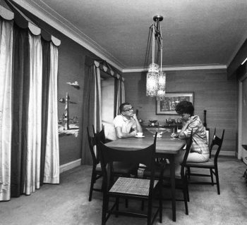 Bill and Ann Cullen sit at their Edward Wormley for Dunbar dining set that will be sold at Abell Auction Co. in early 2019